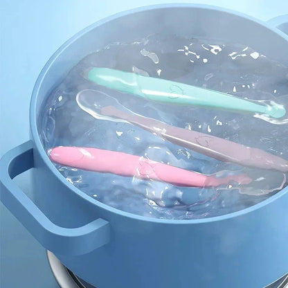 BPA-free silicone baby spoons gentle on tiny gums — Use Lovy