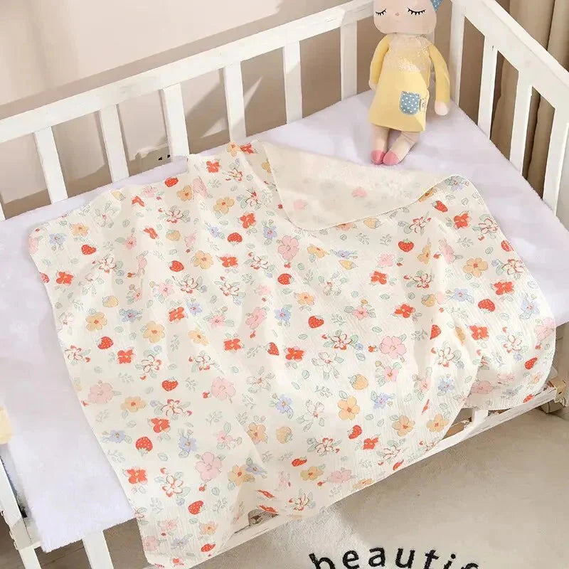 Pastel muslin baby blanket in cream and blush — Use Lovy